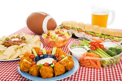 Table spread with appetizer trays for the super bowl 2013 football party.