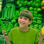 Healthy grocery savings with kids children in the supermarket