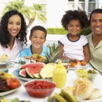 Summer Barbecue family eating together