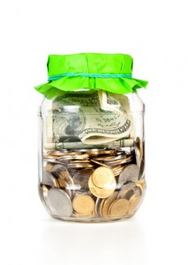 Glass bank for tips with money