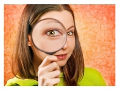 woman with magnifying glass