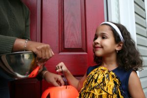 A girl dressed up to go trick or treating