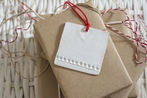 gift box wrapped in recycled paper with label